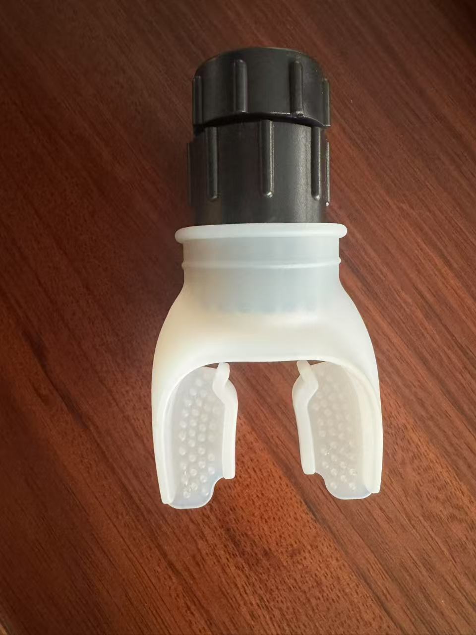 The Fitness Trainer portable lung capacity abdominal breathing trainer has adjustable resistance